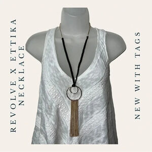 REVOLVE X ETTIKA 20” NECKLACE CIRCLE‎ WITH GOLF TASSELS/BLACK BRAIDED MATERIAL